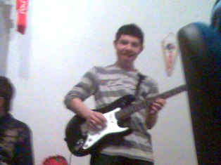 mato with eletrric guitar.jpg